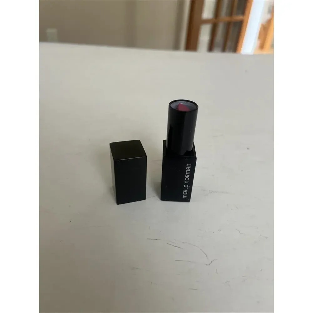 Merle Norman Plush Lipstick....Shade is FLUTTER.....NEW